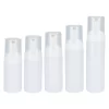 empty white color foaming bottles